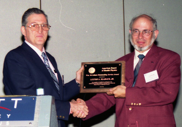 ABHP Chair Carl Distenfeld with Awardee Les Slaback