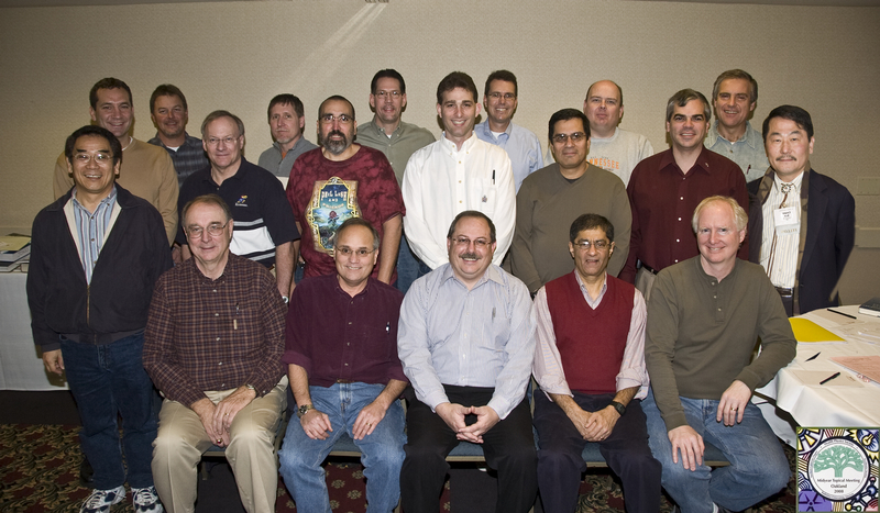 Photo from 2008 Meeting: Front row (l to r): Tosh Ushino (standing), Ron Mlekodaj, Panel Chair Pat LaFrate, Andy Miller, Govind Rao, Bob May Second row (l to r): David Tucker, Wayne Gaul, Joe Guido, David Burkett, Dan Menchaca, Greg Jones, Casper Sun Back row (l to r): Hans Oldewage, Willie Harris, Jack Buddenbaum, Jeff Chapman, Kelly Ausbrooks, Krzysztof Szornel